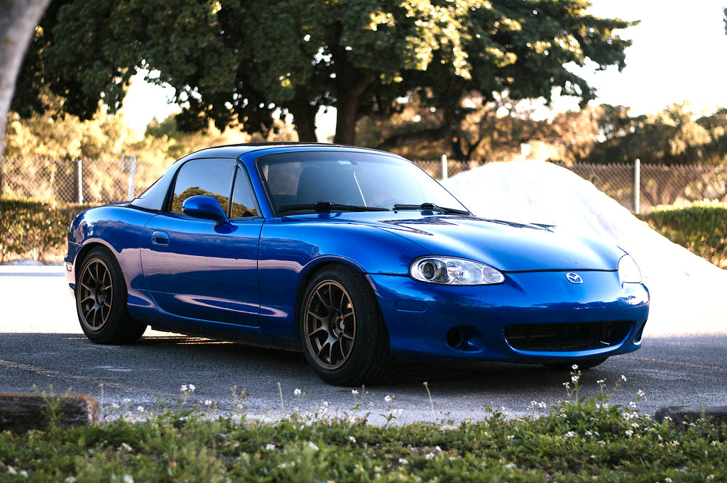 Blue Mazda Miata with Jongbloed Racing Wheels S500 / Series 500 Wheels in Satin Bronze 15 inch 4x100
