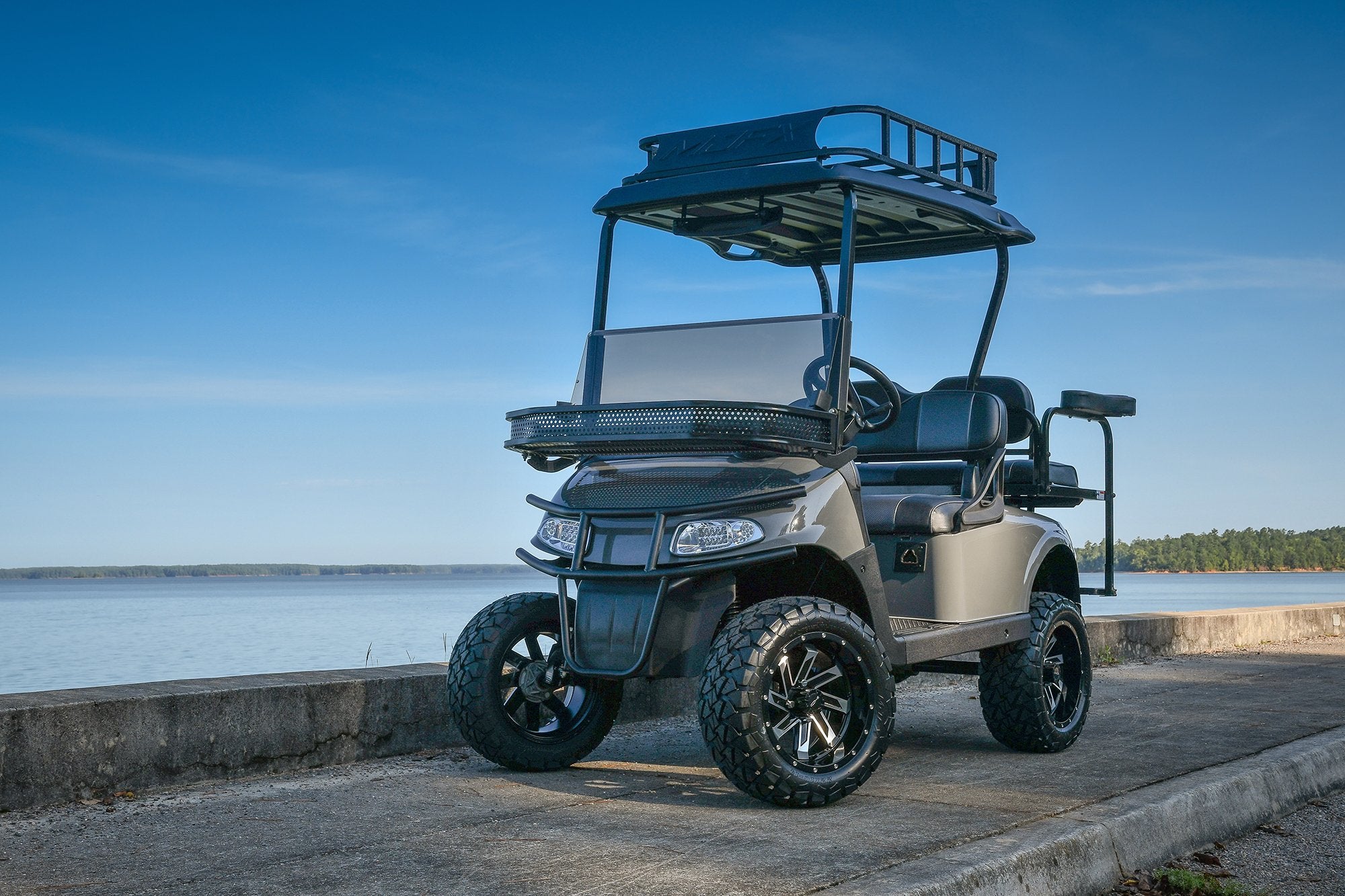 HD Golf Wheels Golf Wheel & Tire Packages HD Golf Wheel & Tire Package - 12x7.0 SAW Gloss Black Machined w 23 Inch A/T Tire ( 4pc )