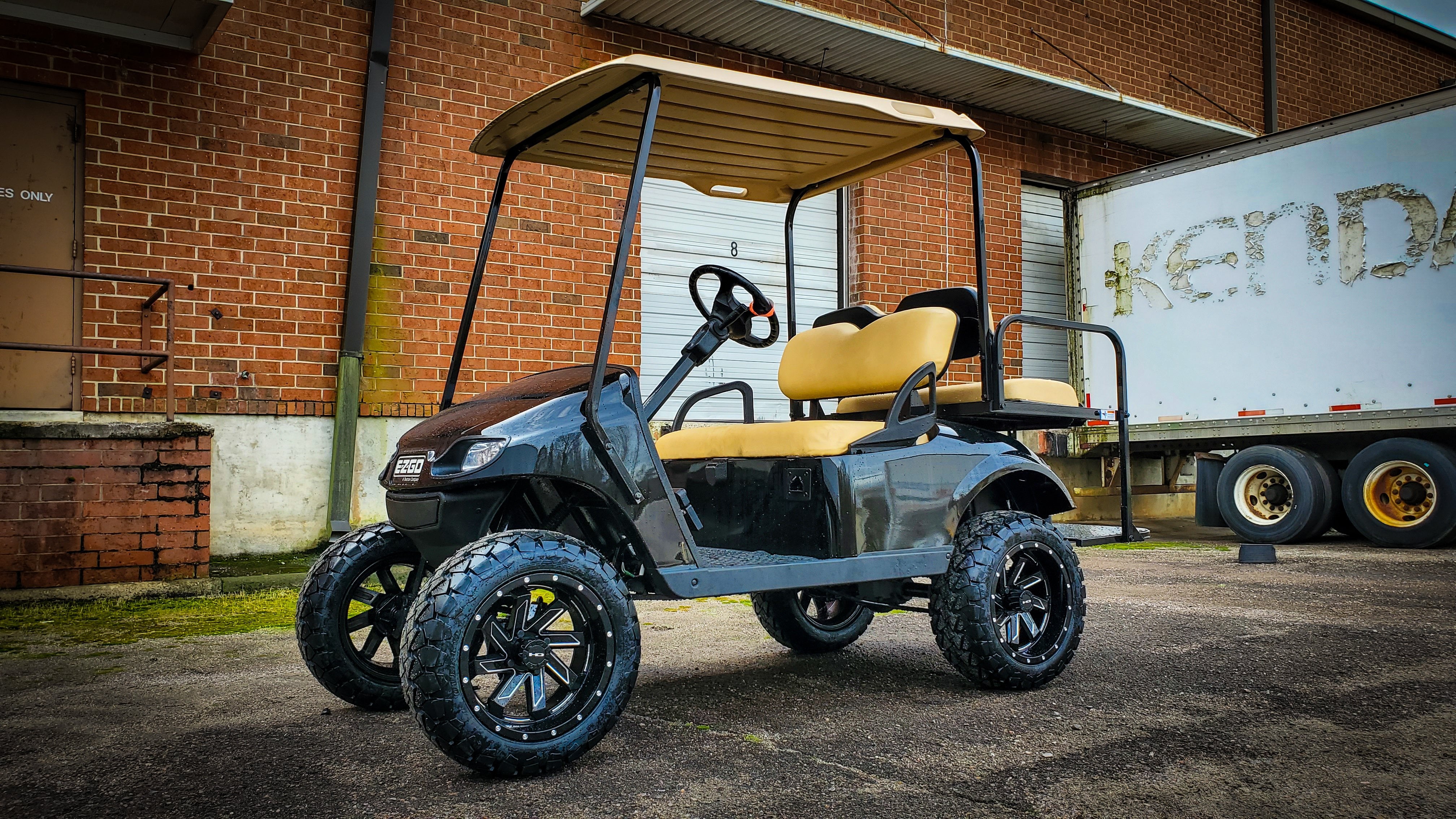 HD Golf Wheels Golf Wheel & Tire Packages HD Golf Wheel & Tire Package - 12x7.0 SAW Gloss Black Milled Edges w 23 Inch A/T Tire ( 4pc )