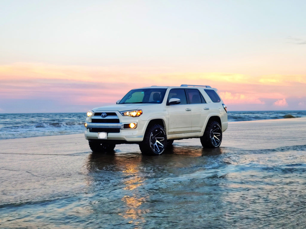 White Toyota 4-Runner with the HD Off-Road Wheels Canyon with Satin Black Machined Face in 20x10.0 with 33 inch Cooper