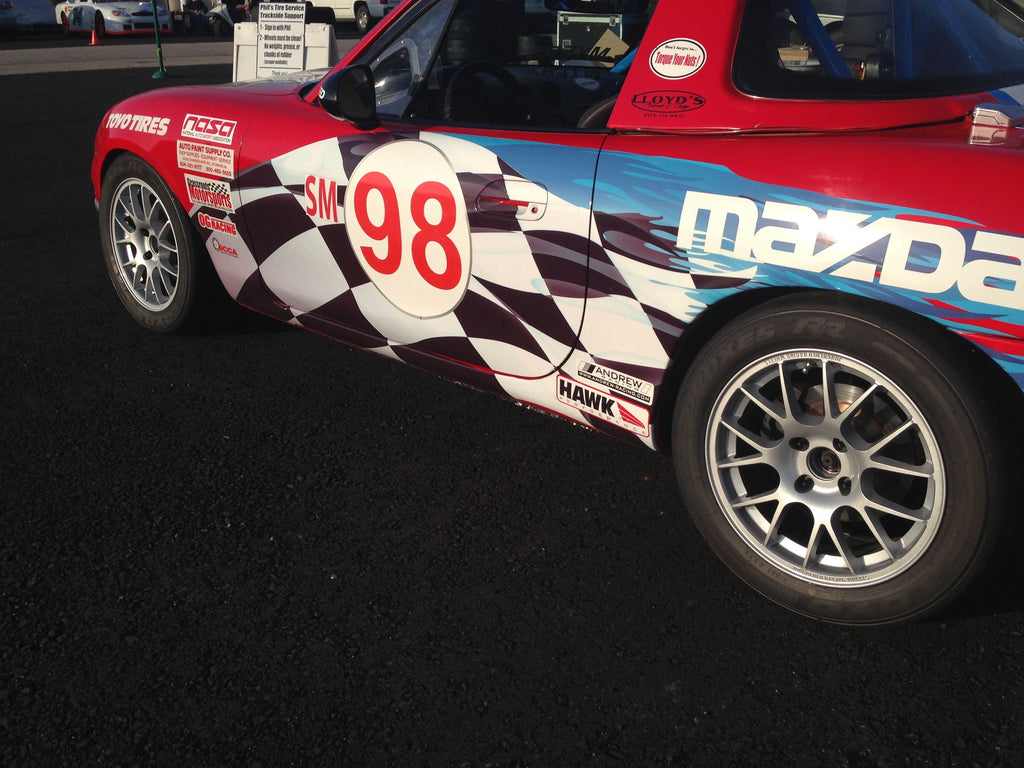 Jongbloed Racing Wheels Spec Miata Wheels in 15x7.0 4x100 25mm Offset in Silver on Red Track Racecar NASA SCCA