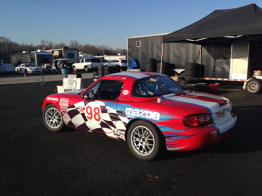 Jongbloed Racing Wheels Spec Miata Wheels in 15x7.0 4x100 25mm Offset in Silver on Red Track Racecar NASA SCCA