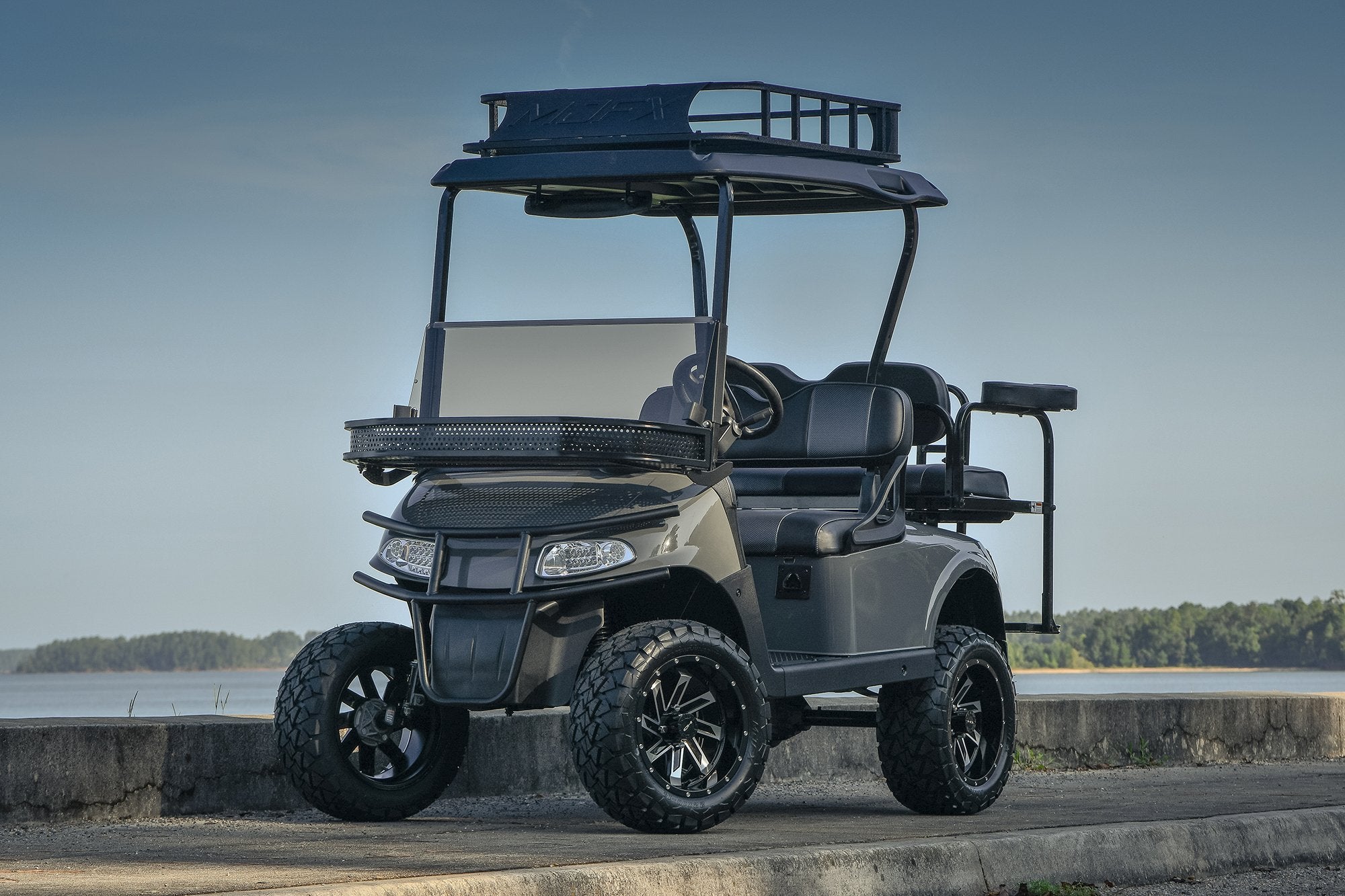 HD Golf Wheels Golf Wheel & Tire Packages HD Golf Wheel & Tire Package - 12x7.0 SAW Gloss Black Machined w 23 Inch A/T Tire ( 4pc )