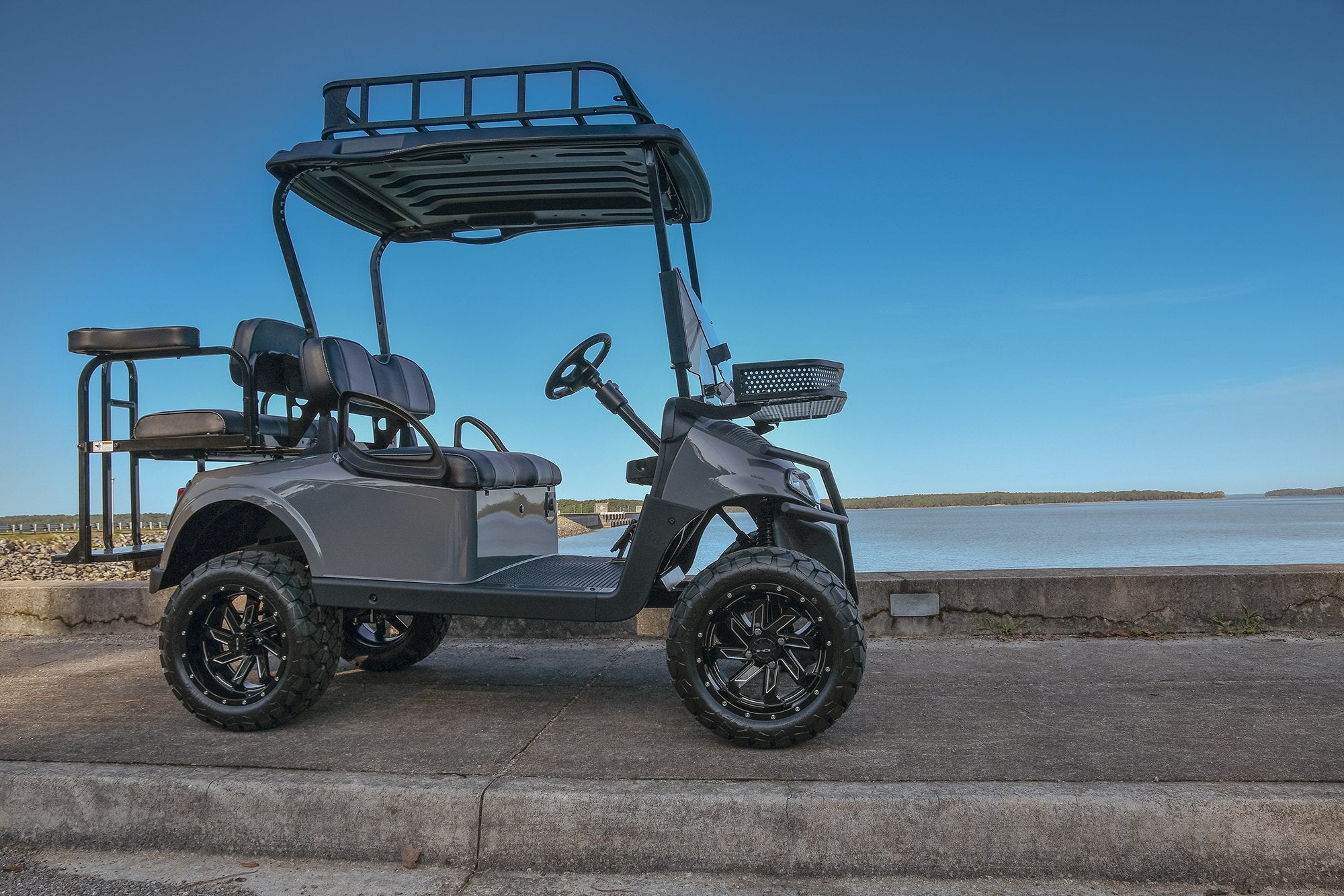 HD Golf Wheels Golf Wheel & Tire Packages HD Golf Wheel & Tire Package - 12x7.0 SAW Gloss Black Machined w 23 Inch A/T Tire ( 4pc )