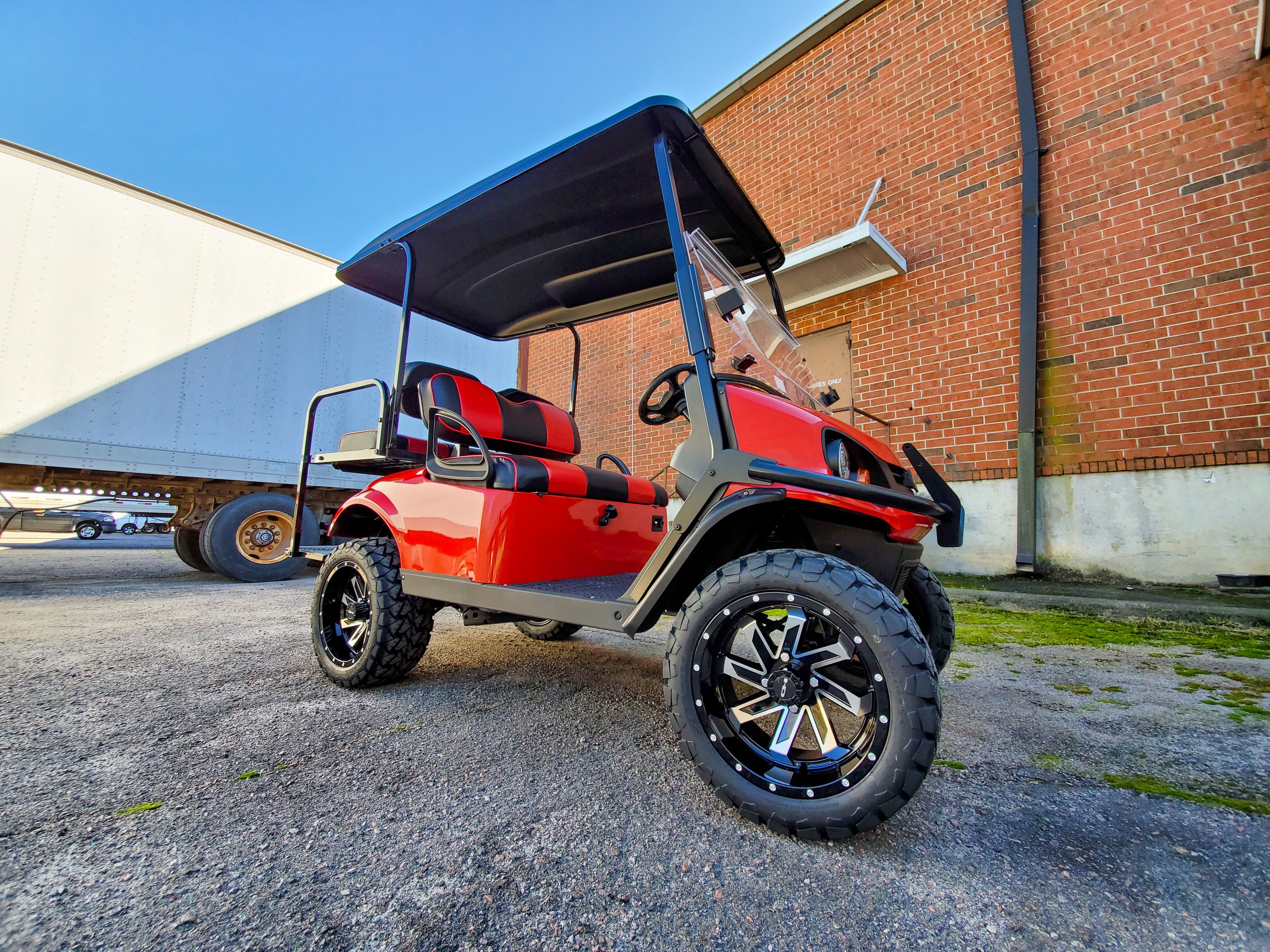 HD Golf Wheels Golf Wheel & Tire Packages HD Golf Wheel & Tire Package - 12x7.0 SAW Gloss Black Machined w 23 Inch A/T Tire ( 4pc )