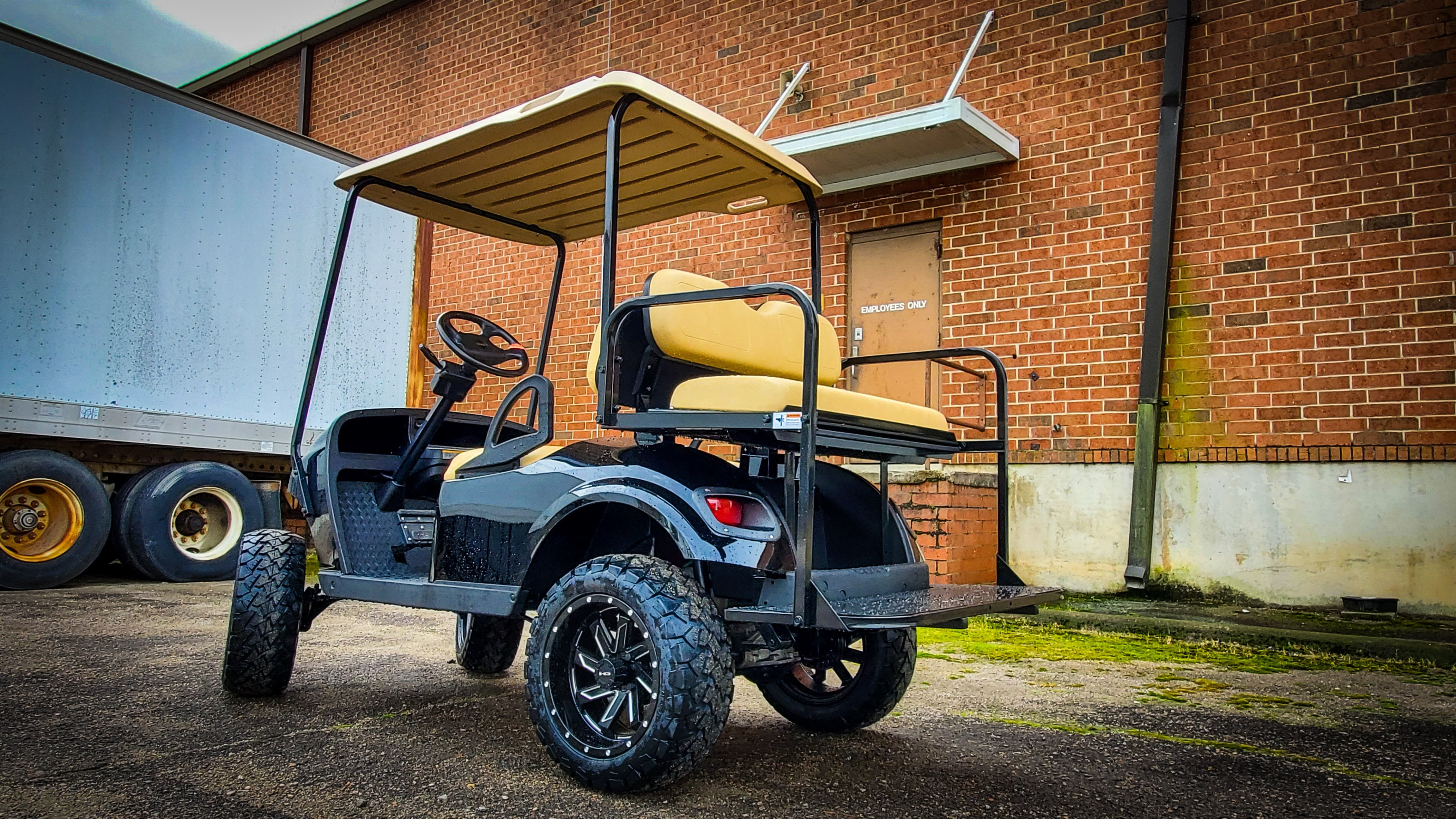 HD Golf Wheels Golf Wheel & Tire Packages HD Golf Wheel & Tire Package - 12x7.0 SAW Gloss Black Milled Edges w 23 Inch A/T Tire ( 4pc )