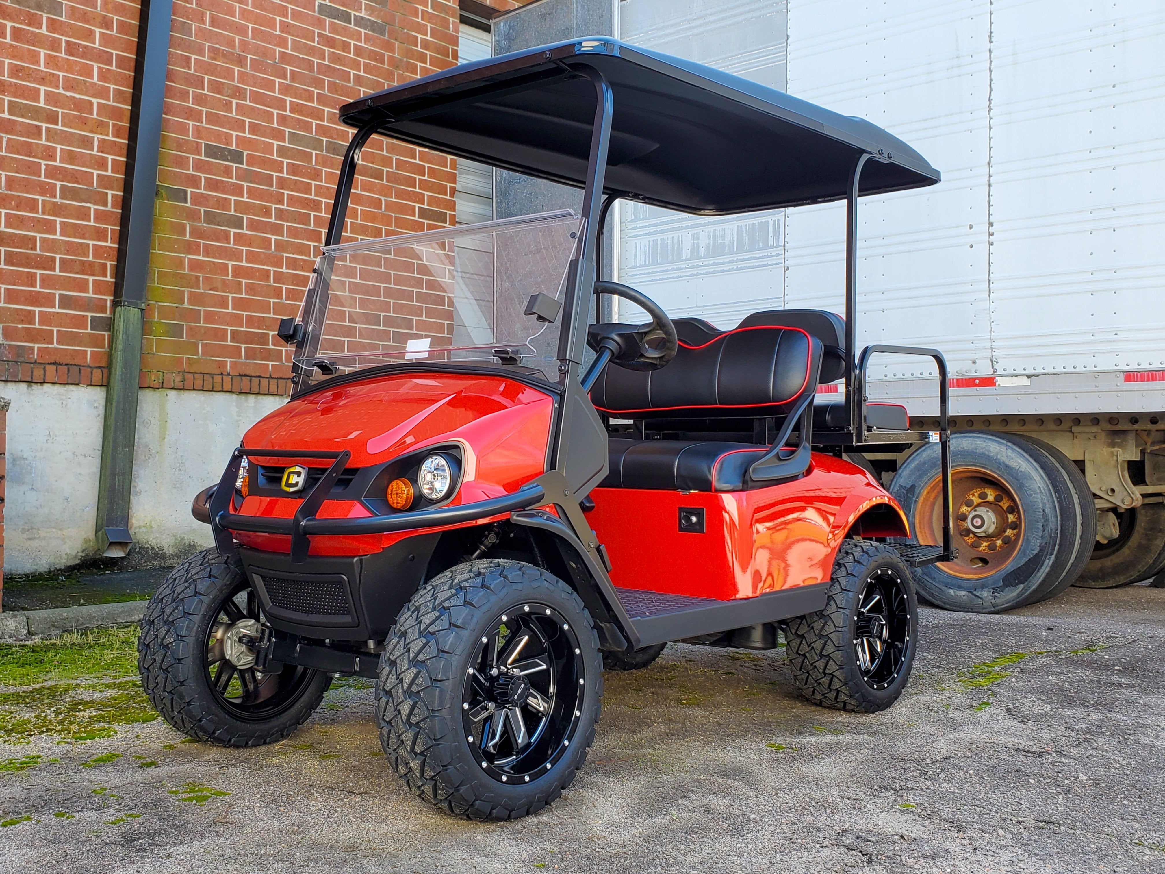 HD Golf Wheels Golf Wheel & Tire Packages HD Golf Wheel & Tire Package - 12x7.0 SAW Gloss Black Milled Edges w 23 Inch A/T Tire ( 4pc )